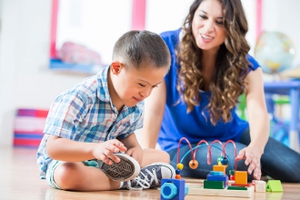 A Child playing with an adult